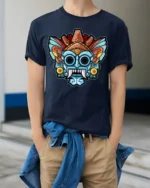 Colorful Tribal Mask Monster Graphic T Shirt Bold Art Tee - model wearing navy tee with hands in pockets