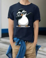 Funny Dabbing Penguin With Sunglasses Cool Graphic T Shirt - model wearing navy tee with hands in pockets