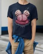 Knitting Brain Graphic T Shirt Dark Artistic Surreal Tee - model wearing navy tee with hands in pockets
