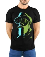 Cool Bearded Cowboy Smoking Cigar Graphic T Shirt - model wearing black tee with hands behind back