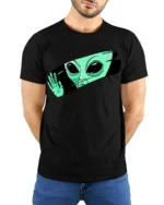 Funny Alien Peeking Graphic T Shirt Cute UFO Cartoon Tee - model wearing black tee with hands behind back