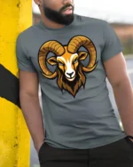 Bold Ram Head Graphic T Shirt Fierce Animal Style Tee - model wearing grey tee, leaning on column