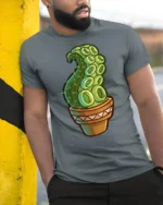 Funny Octopus Tentacle Cactus Plant Cartoon Graphic T Shirt - model wearing grey tee, leaning on column