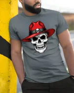 Skull With Red Hat Graphic T Shirt Cool Gothic Style Tee - model wearing grey tee, leaning on column