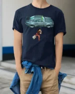Retro Sports Car Traveler Adventure Cool Graphic T Shirt - model wearing navy tee with hands in pockets