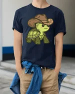 Cute Cowboy Turtle Graphic T Shirt Funny Western Animal Style Tee - model wearing navy tee with hands in pockets