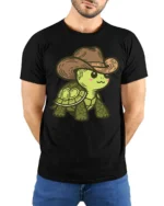 Cute Cowboy Turtle Graphic T Shirt Funny Western Animal Style Tee - model wearing black tee with hands behind back