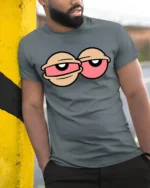 Tired Eyes Funny Cartoon T Shirt Lazy Mood Graphic Tee Style - model wearing grey tee, leaning on column