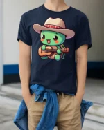 Cute Turtle Cowboy Playing Guitar Funny Cartoon T Shirt Kawaii Style Tee - model wearing navy tee with hands in pockets
