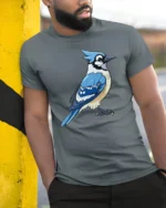 Blue Jay Bird Graphic T Shirt Cute Nature Wildlife Art Style Tee - model wearing grey tee, leaning on column