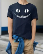 Creepy Cat Smile Halloween Spooky Graphic T Shirt - model wearing navy tee with hands in pockets