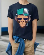 Cool Monkey Smoking Streetwear Cartoon Graphic T Shirt - model wearing navy tee with hands in pockets