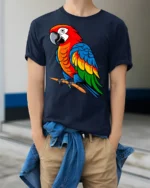 Colorful Parrot Bird Tropical Animal Graphic T Shirt - model wearing navy tee with hands in pockets