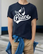 Peace Dove Symbol Positive Message Graphic T Shirt - model wearing navy tee with hands in pockets