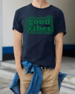 Good Vibes Only Positive Energy Aesthetic Graphic T Shirt - model wearing navy tee with hands in pockets
