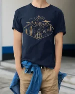 Mountain Adventure Hiking Backpack Nature Graphic T Shirt - model wearing navy tee with hands in pockets