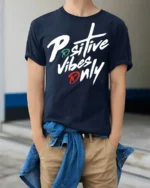 Positive Vibes Only Bold Script Motivational T Shirt - model wearing navy tee with hands in pockets