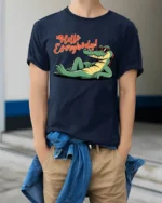 Hello Everybody Funny Alligator Cartoon Graphic T Shirt - model wearing navy tee with hands in pockets