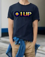 Level Up Gamer Pixel Retro Arcade Graphic T Shirt - model wearing navy tee with hands in pockets