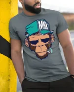 Cool Monkey Smoking Streetwear Cartoon Graphic T Shirt - model wearing grey tee, leaning on column