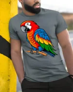 Colorful Parrot Bird Tropical Animal Graphic T Shirt - model wearing grey tee, leaning on column