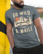 Go Wild For A While Vintage Nature Adventure T Shirt - model wearing grey tee, leaning on column