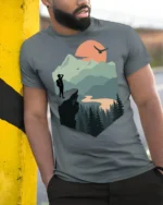 Mountain Sunset Hiker Adventure Nature Scenic T Shirt - model wearing grey tee, leaning on column
