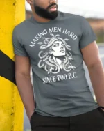 Medusa Making Men Hard Funny Mythology Graphic T Shirt - model wearing grey tee, leaning on column