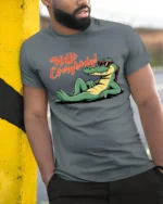 Hello Everybody Funny Alligator Cartoon Graphic T Shirt - model wearing grey tee, leaning on column