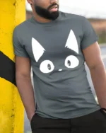 Cute Cat Eyes Minimalist Funny Graphic T Shirt - model wearing grey tee, leaning on column
