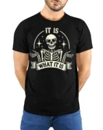 Funny It Is What It Is Skeleton Vintage Graphic T Shirt - model wearing black tee with hands behind back