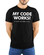 My Code Works I Have No Idea Why Funny Dev T Shirt - model wearing black tee with hands behind back