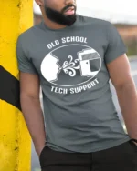 Old School Tech Support Blow Cartridge Funny Retro T Shirt - model wearing grey tee, leaning on column