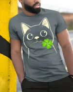 Adorable Black Cat Clover Lucky Charm Cartoon T Shirt - model wearing grey tee, leaning on column