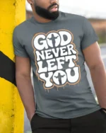 God Never Left You Inspirational Faith Quote Graphic T Shirt - model wearing grey tee, leaning on column