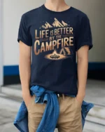 Life Is Better By The Campfire Camping Adventure Tee - model wearing navy tee with hands in pockets