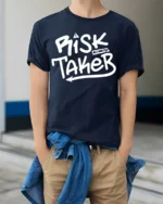Risk Taker Bold Street Style Motivational Graphic Tee - model wearing navy tee with hands in pockets