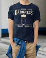 Hello Darkness My Old Friend Beer Humor Graphic Tee - model wearing navy tee with hands in pockets