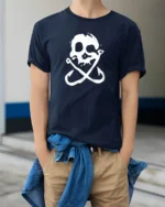 Skull Fishing Hooks Pirate Style Funny Graphic Tee - model wearing navy tee with hands in pockets