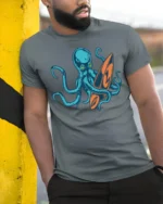 Cool Octopus Surfboard Beach Wave Graphic Tee Design - model wearing grey tee, leaning on column