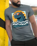 Funny Sea Monster With Sunglasses Ocean Graphic T Shirt - model wearing grey tee, leaning on column
