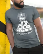 In Pizza We Crust Funny Illuminati Pizza Graphic Tee - model wearing grey tee, leaning on column