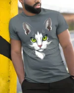 Adorable Cat Face Green Eyes Cute Pet Graphic T Shirt - model wearing grey tee, leaning on column