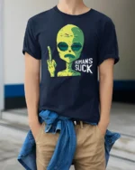 Funny Alien Humans Suck Graphic T Shirt Sarcastic Humor Tee - model wearing navy tee with hands in pockets