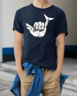 Shark Hand Gesture Graphic T Shirt Funny Ocean Animal Tee - model wearing navy tee with hands in pockets