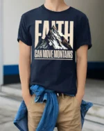 Faith Can Move Mountains Inspirational Graphic T Shirt - model wearing navy tee with hands in pockets