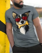 Stylish Dog Wearing Shades With Bone Fun Graphic Tee Shirt - model wearing grey tee, leaning on column