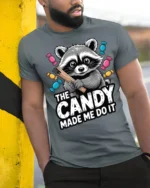Candy Made Me Do It Raccoon Funny Graphic T Shirt - model wearing grey tee, leaning on column
