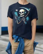 Funny Grim Reaper Phone Addict Graphic T Shirt Dark Humor Style - model wearing navy tee with hands in pockets