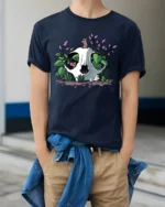 Whimsical Skull With Flowers Nature Lover Artistic T Shirt - model wearing navy tee with hands in pockets